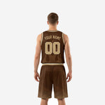 Opposite side view of brown and gold men's custom basketball uniform showing shorts waistband and hem detail