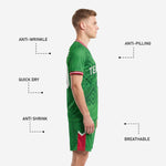 Detail view of custom Kelly Green soccer shorts with red side panel and white player number for mens soccer team uniforms