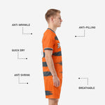 Custom orange soccer shorts with Graphite brushstroke accents and player number on left leg