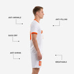 Men soccer outfit side view showing anti-wrinkle, anti-pilling, quick-dry, anti-shrink, and breathable fabric features in orange and white