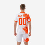 Men soccer outfit in orange and white with custom player name and number on the back, full uniform set rear view