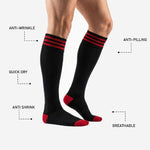 Red contrast heel panel detail on custom red and black mens soccer socks made to order