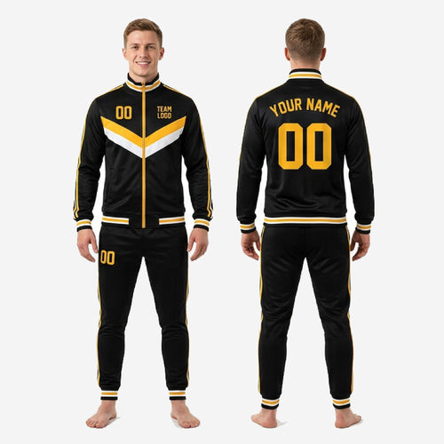 Men's custom soccer tracksuit in black and gold with ribbed ankle bands and matching stripe trim, full set view