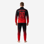 Close-up of mens gradient soccer tracksuit jacket showing stand collar full zip and ribbed fire red cuffs