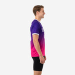 Left side view of mens custom pink soccer training jersey showing Royal Purple to Hot Pink gradient fade and white sleeve cuff trim
