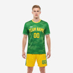 Mens green soccer uniforms front view showing Kelly Green camo jersey and Athletic Gold shorts with custom team name and number