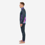 Side view of mens sublimated soccer tracksuit in charcoal, multicolor floral-splash contrast panels on sleeves and jacket sides, teal stand collar trim visible