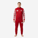 Mens red soccer tracksuit with white tiger-stripe sleeve and thigh panels, full zip stand collar jacket and tapered pants, front view