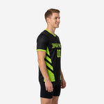 Side view of black and neon green mens soccer practice jersey showing neon green side panel construction