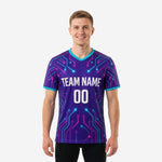 Mens soccer practice jersey in Royal Purple with neon Turquoise and Hot Pink geometric circuit board sublimation print, V-neck, short sleeve, front view on male model