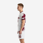 Full-dye sublimated men's soccer team uniforms in maroon and white, right-side view showing maroon crew neckline trim and cuff detail