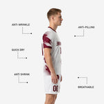 Custom sublimated soccer uniform shorts in white with maroon splash pattern and player number printed on front leg panel