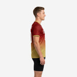 Custom mens soccer training jersey showing Maroon-to-Athletic Gold gradient and Athletic Gold sleeve cuff trim, left side view