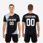 Close-up of silver-grey V-neck collar and sleeve cuff trim on custom black mens soccer training top with full sublimation print