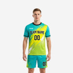 Mens soccer uniform men in teal and neon yellow full-dye sublimated kit, front view with team name and number printed on jersey and matching shorts
