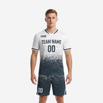 Men's soccer uniforms in white and charcoal dot-burst sublimation print, full kit front view with team name and number