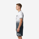 Men's soccer uniforms white and charcoal dot-burst kit, right side profile showing sleeve trim and shorts chevron detail