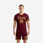Men's soccer uniforms in maroon with Athletic Gold geometric trim, V-neck jersey and matching shorts, front view