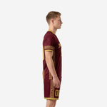 Custom men's soccer uniform set in maroon and gold geometric border design, left side panel view