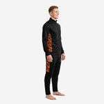 Mens custom orange and black soccer tracksuit side view showing tiger camo panels running from underarm to ankle