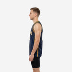 Side view of men's sublimated navy and gold basketball jersey showing gold side panel running from armhole to hem
