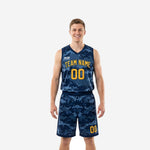 Navy and gold basketball uniforms full set with digital camo pattern, arced team name, and gold numbers on jersey and shorts front and back