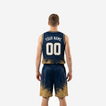 Opposite side view of custom navy and gold basketball uniforms showing sleeveless jersey armhole binding and shorts waistband construction detail