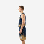 Side view of navy and gold sublimated basketball uniform set showing athletic cut jersey and shorts with matching gold burst pattern on the leg