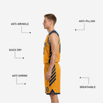 Shorts detail of the navy and gold reversible basketball uniform showing chevron leg panels, hem binding, and player number 00