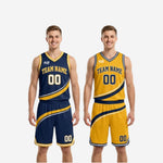Close-up detail of diagonal stripe on navy and gold reversible basketball uniform showing gold band with white edge trim and V-neck binding construction