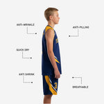 Close detail of navy and gold youth basketball shorts showing gold geometric side panel player number and white trim construction
