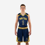 Navy and gold youth basketball uniforms front and back view showing arced team name, front number, and diagonal gold side panels on jersey and shorts