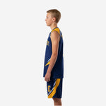 Opposite side view of custom navy and gold youth basketball uniform showing geometric panel construction and shorts leg panel detail
