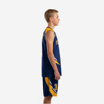 Side profile of navy and gold youth basketball uniform set showing gold swoosh side panels on jersey and shorts with white trim accent lines