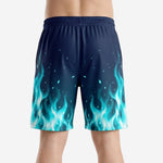 Left-side view of navy basketball shorts showing the sublimated cyan flame pattern and the glowing spark detail across the thigh panel