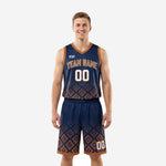 Navy basketball uniforms with Aztec geometric pattern, burnt-orange binding, and arced team name on the chest - full two-piece set front view
