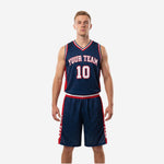 Custom navy basketball uniforms with red side panels and white trim showing full 2-piece set front view on adult male model