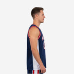 Front view of navy blue basketball jersey showing number 23 and arced team name in white with red outline
