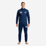 Men's navy soccer tracksuit with sky blue hex print, full-zip stand collar jacket and tapered pants, front view with team logo and number 00