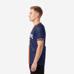 Right side view of a custom men soccer jersey in navy blue and orange displaying back surname and number print zones