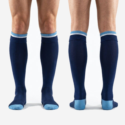 Pair view of custom navy blue soccer socks with sky blue stripe cuff and sky blue toe block laid flat
