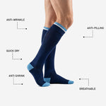 Close-up of sky blue contrast toe block on custom navy blue soccer socks showing reinforced construction