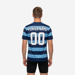 Close-up detail of sublimated chest print on Navy Blue and Sky Blue stripe custom soccer training jersey with white team name and number