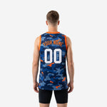 Back view of navy and orange camo sublimated basketball jersey showing back number and player name print zones