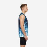Front view of navy custom basketball jerseys showing blue flame pattern rising from the straight hem with cyan armhole binding and large white front number