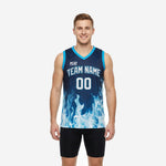 Navy custom basketball jerseys with blue flame sublimation graphic, cyan V-neck trim, arced team name and front number on a male model, front view