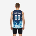 Right side view of the navy sublimated basketball jersey highlighting the sleeveless athletic cut, cyan collar trim, and blue flame gradient detail