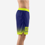 Side view of custom navy and gold basketball shorts showing the halftone dot transition from navy body to neon gold hem and side split at leg opening