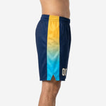 Side view of custom navy and gold basketball shorts showing full-length gold to cyan gradient side panel and hem split