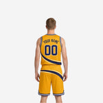 Opposite side view of the two sided basketball uniform set showing gold jersey and shorts with navy swoosh panel detail